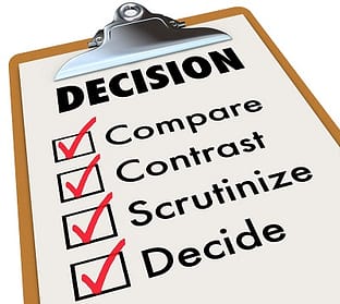 Clipboard with list of checked items to help with making a decision.